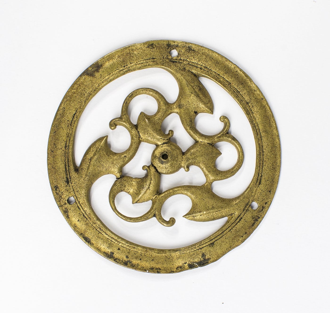 Triskel celtique sur un disque de bronze ajouré de style La Tène